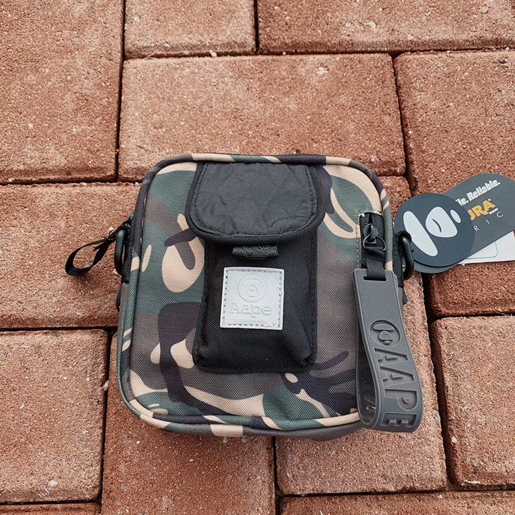 Cross-body bag men's and women's shoulder bag, bungee small square bag for travel. (ALAUDDIN)