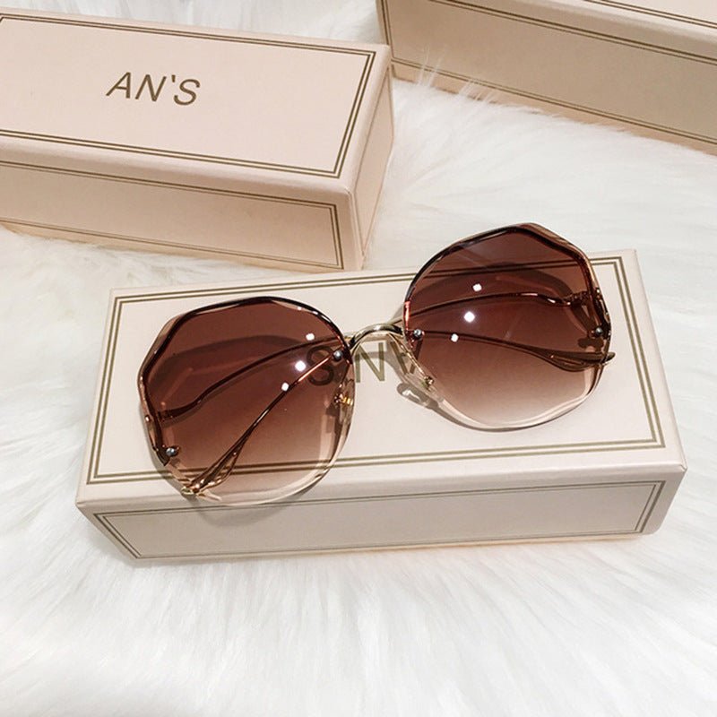 Trendy Metal Curve Edge-cut Frameless Sunglasses For Women